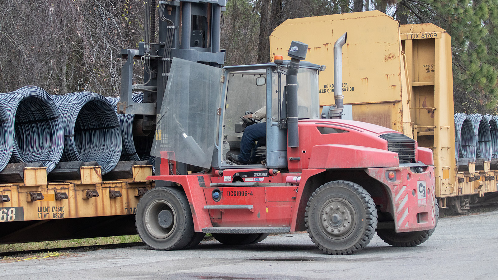 Forklift unloading train car